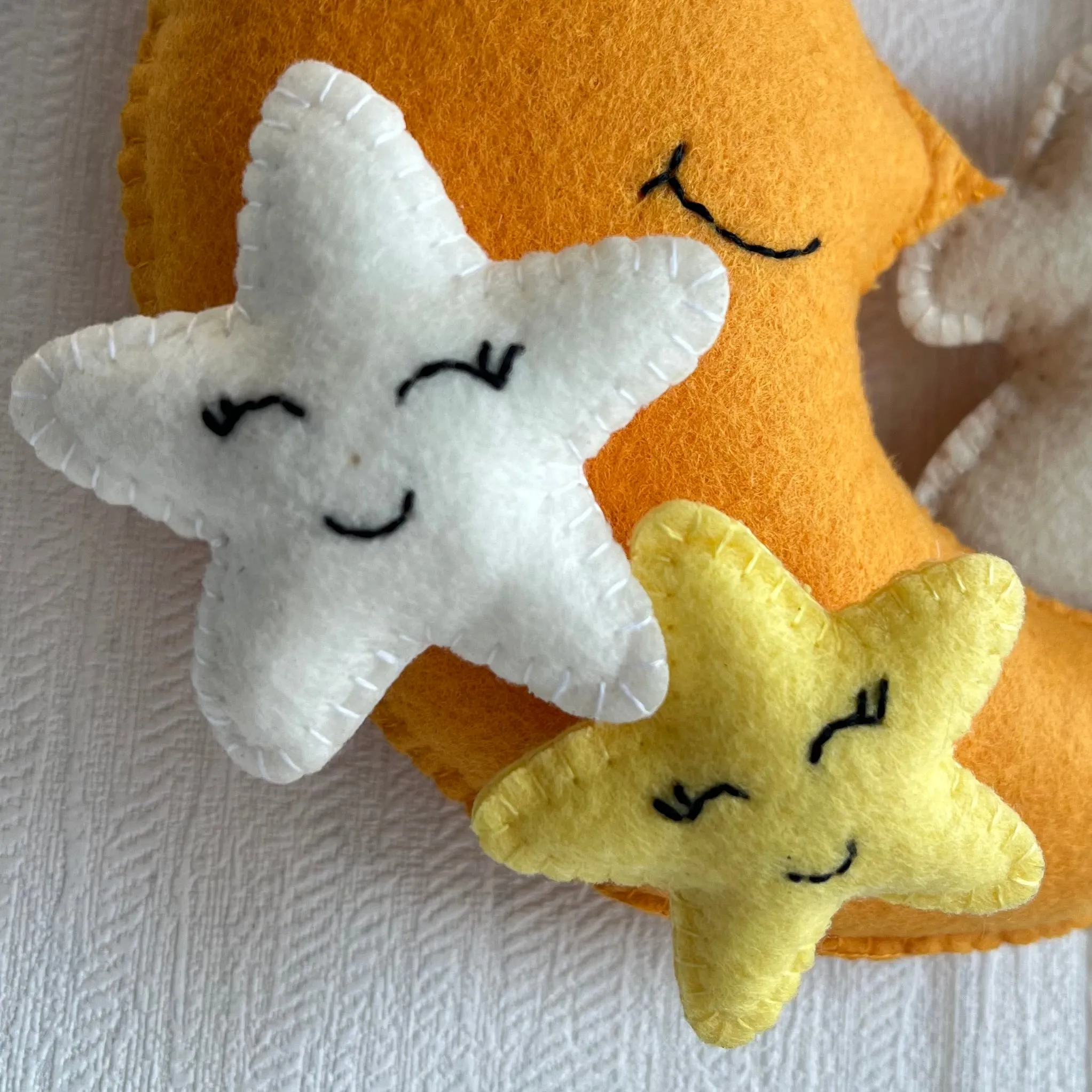 Baby Ellie on a Moon Name Hanging