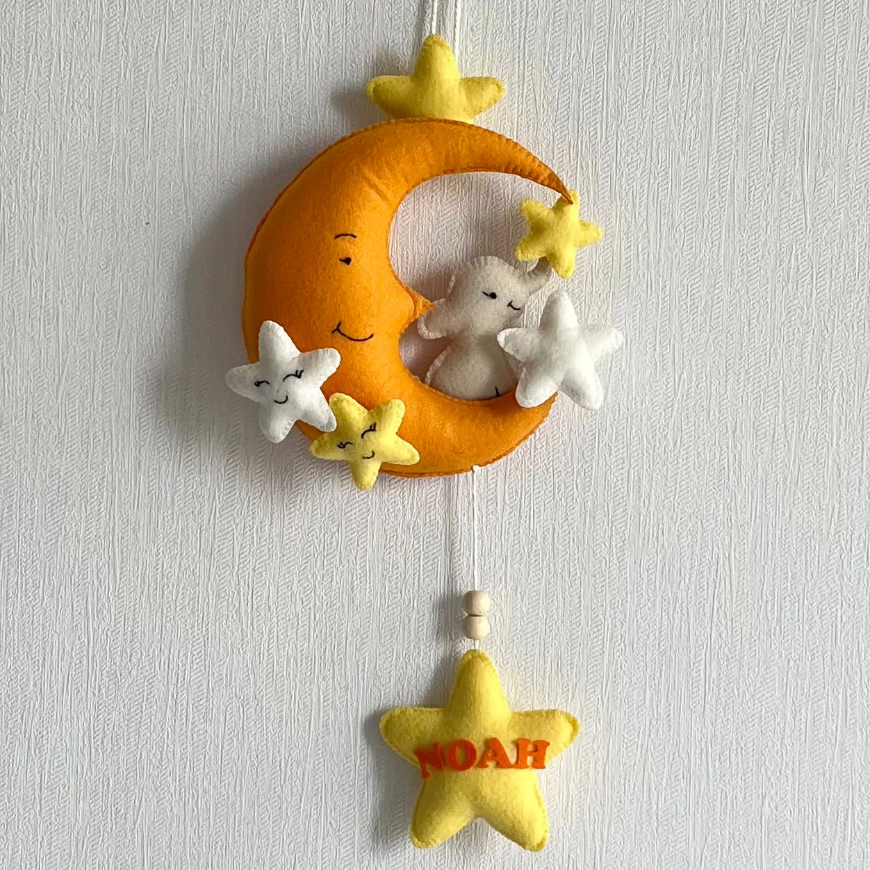 Baby Ellie on a Moon Name Hanging