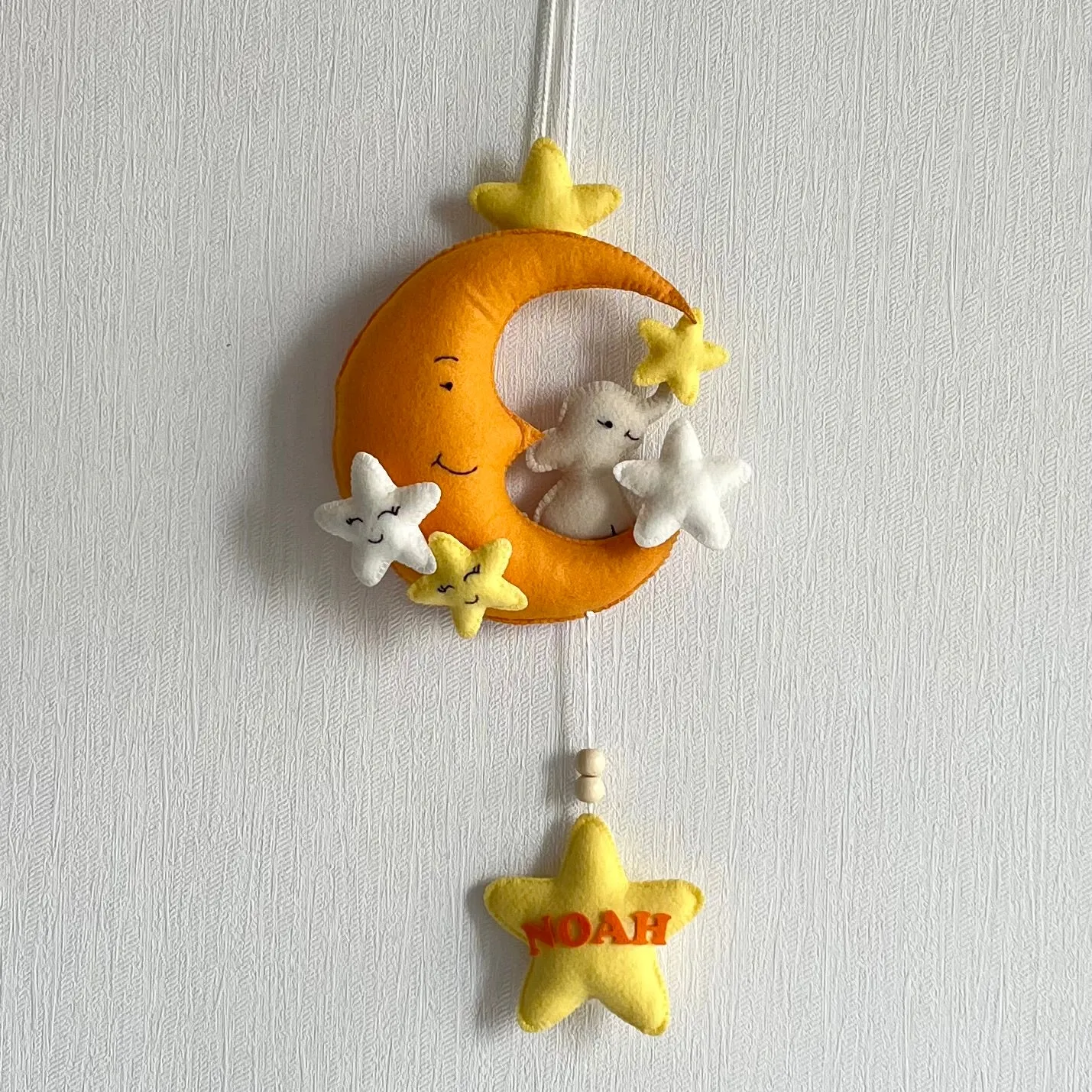 Baby Ellie on a Moon Name Hanging