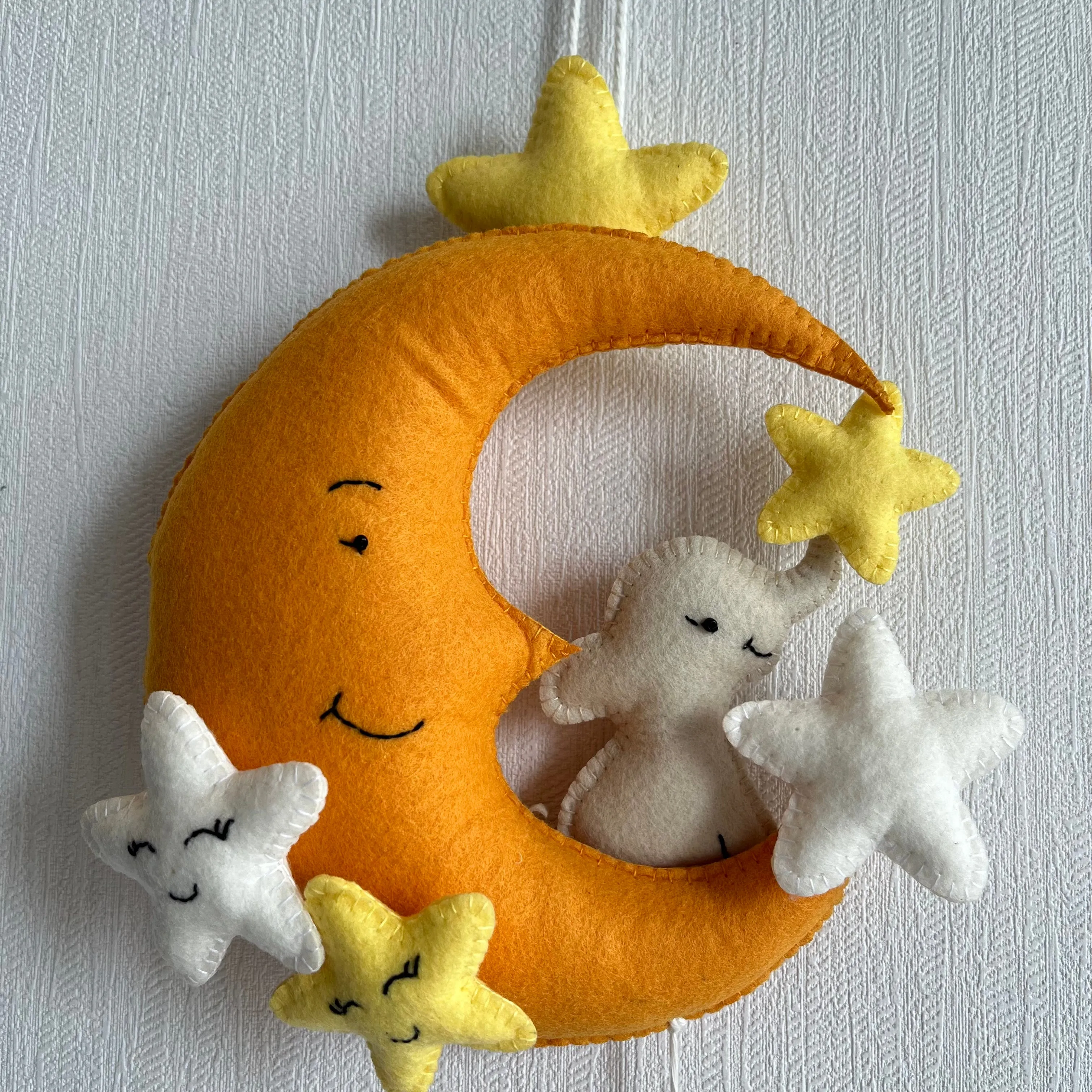 Baby Ellie on a Moon Name Hanging