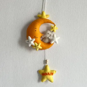 Baby Ellie on a Moon Name Hanging