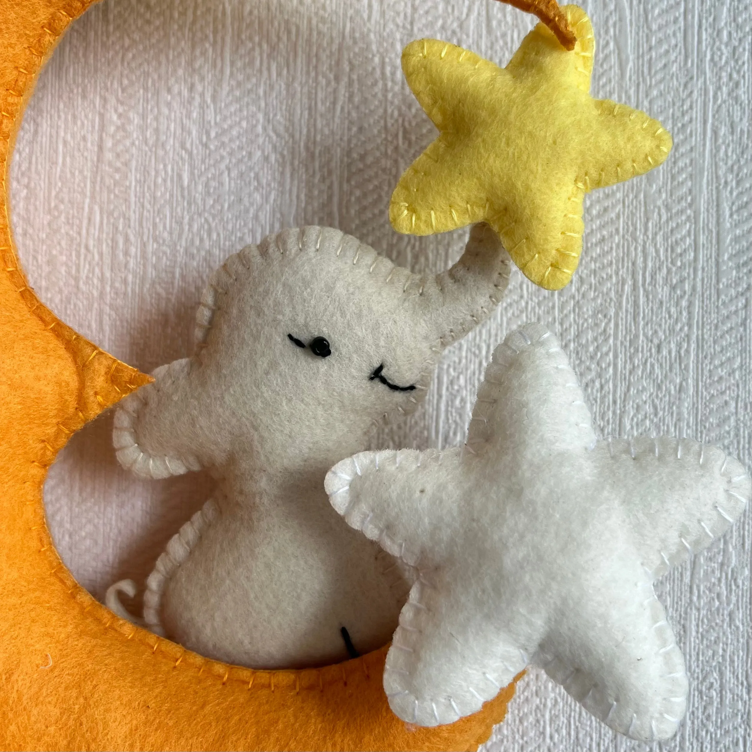 Baby Ellie on a Moon Name Hanging