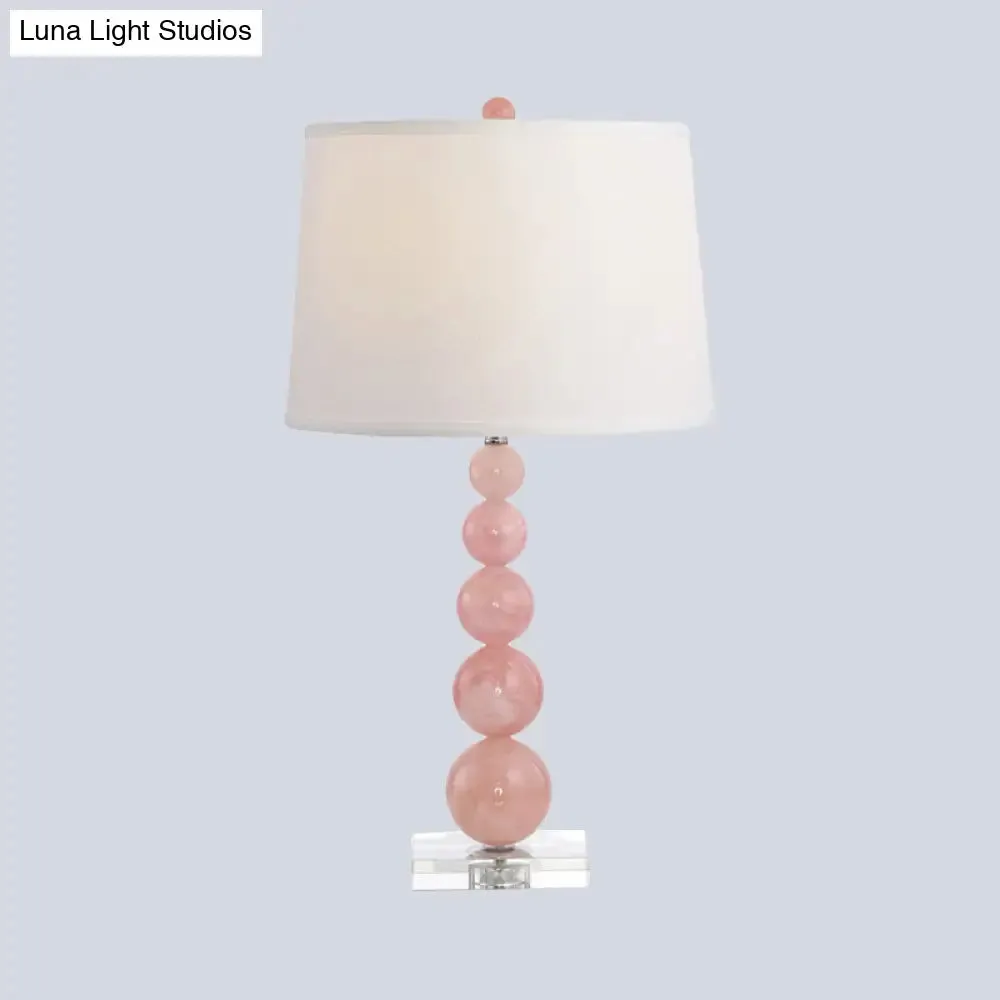 Modern Pink Nightstand Lamp: Barrel-shaped Reading Light with Fabric Shade