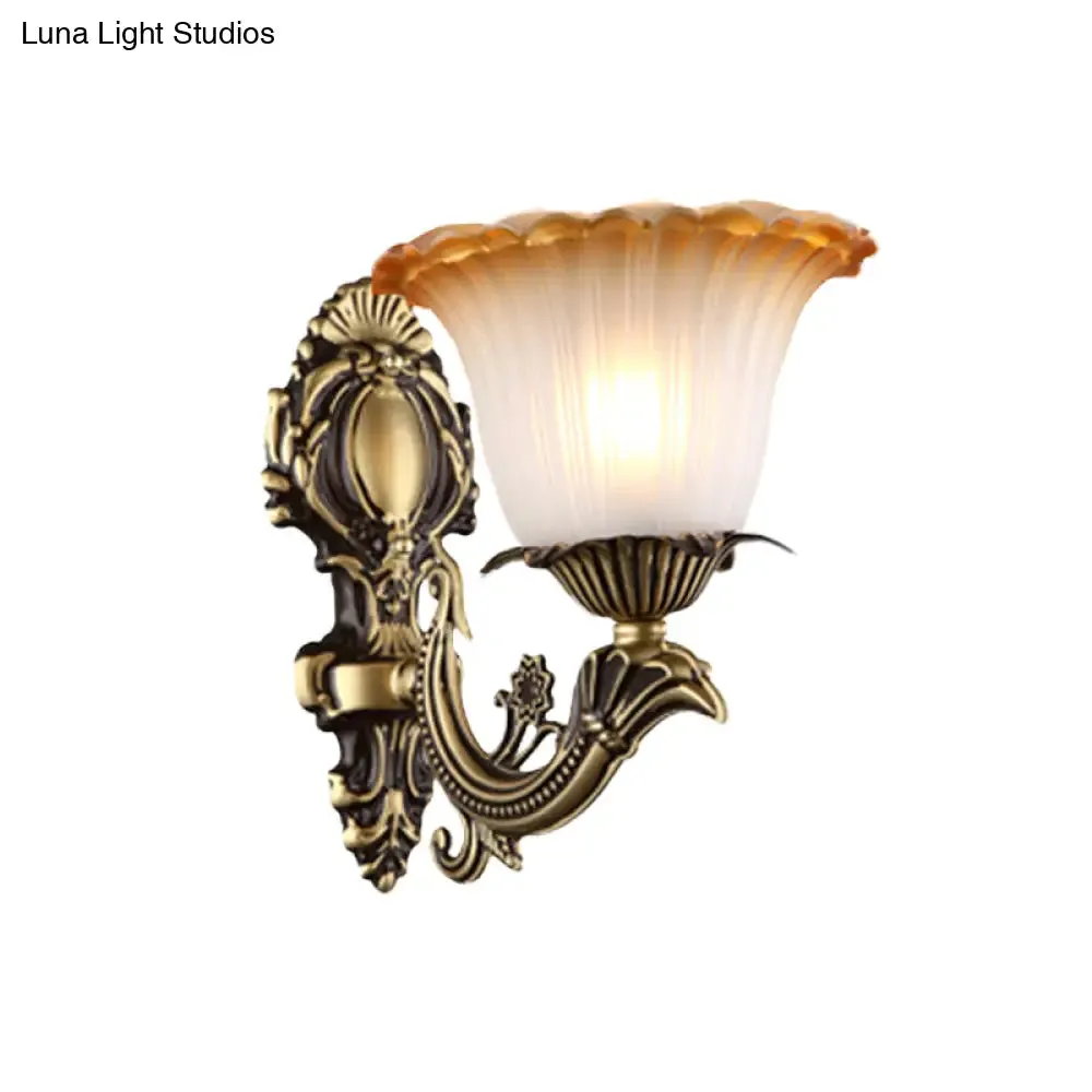 Vintage Floral Wall Sconce with Frosted Glass and Carved Brass Arm