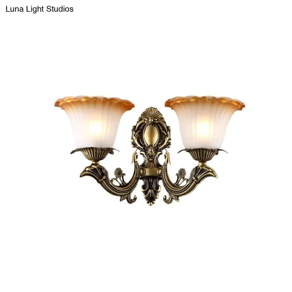 Vintage Floral Wall Sconce with Frosted Glass and Carved Brass Arm